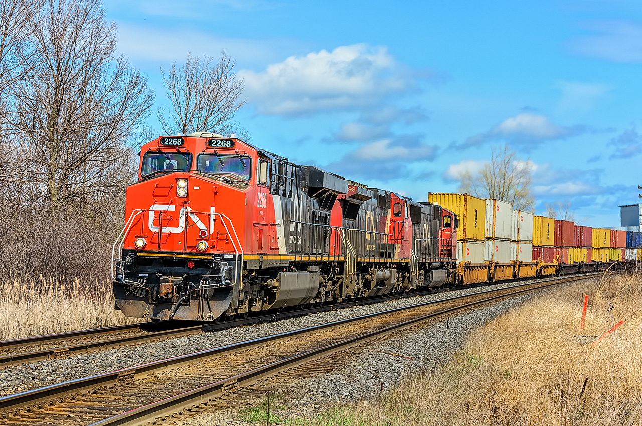 CN train 149 with engine 2268 approaches the road to Darlington Provincial Park east of Oshawa.