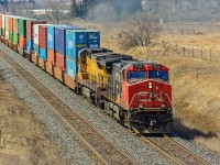 CN 2528 and 2002 eastbound with train 106 at Newtonville Road. The parallel running CP Belleville Sub can be seen near the top of the photo.