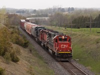 CP 240 snakes it's way along the Belleville Sub with a CN SD60 on the point.