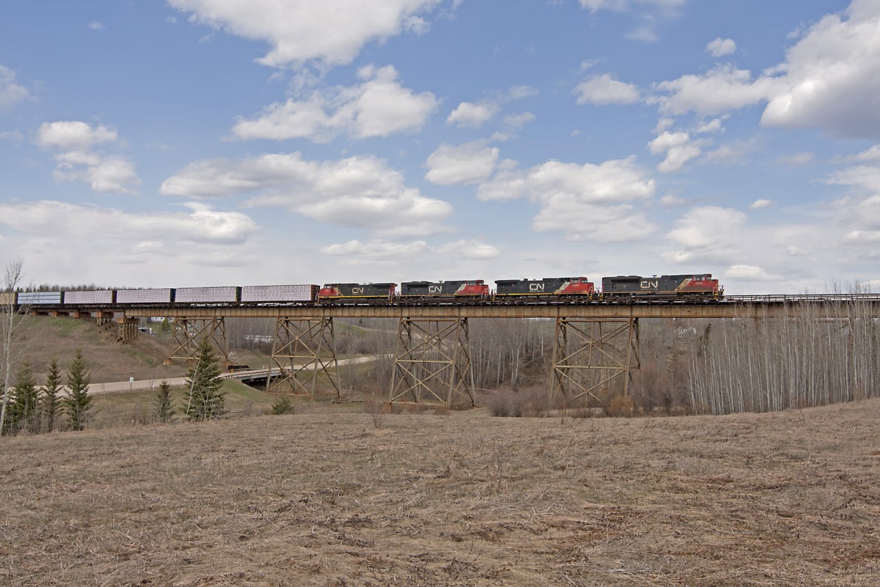 Both major locomotive builders have equal representation on this eastbound freight.