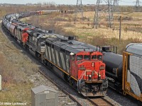 Sometimes good luck and bad luck are inseparable. Good luck is getting X305 with a Draper Taper zebra leading NS 2711 (not a toaster for a change) and another Draper Taper zebra trailing. Bad luck is it being on the north track and its arrival at Bowmanville coinciding with that of 308 on the south. Only plus was the thin veil of cloud weakened the shadows on the north side (with some help from PS). My compliments to the power planners and thanks Delic for the heads up! 1406hrs.
<br><br>

Sometimes you have to make your own luck as a contingency... so I also shot this guy at port Hope and Whitby.