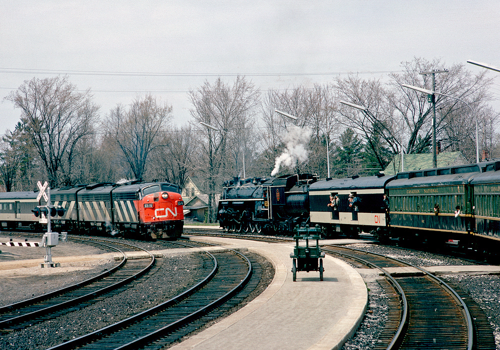 A northbound Upper Canada Railway Society special from Toronto to Gravenhurst with 4-8-4 CN 6218 meets the eastbound Super Continental at Washago.  We came north on the now mostly removed line via Barrie, and returned on the CN main.