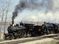 Numerous fantrips were run in the 1970's with the "Credit Valley Railway" 136 and 1057, the famed former CPR 4-4-0 and 4-6-0 (D10) that went onto hauling excursions after the end of steam. On one such run under the Ontario Rail Association, CVR 136 and 1057 haul their train past Campbellville Ontario on the CP's Galt Sub in 1974, with a nice head of steam.
<br><br>
Today, both enjoy a post-retirement career on the South Simcoe Railway, hauling tourists in vintage heavyweight passenger cars along the former CN Beeton Sub out of Tottenham ON.