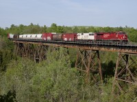 After making a lift and meeting 112 at Oshawa, 241 cruises through Cherrywood with 8905 and SOO 6026.