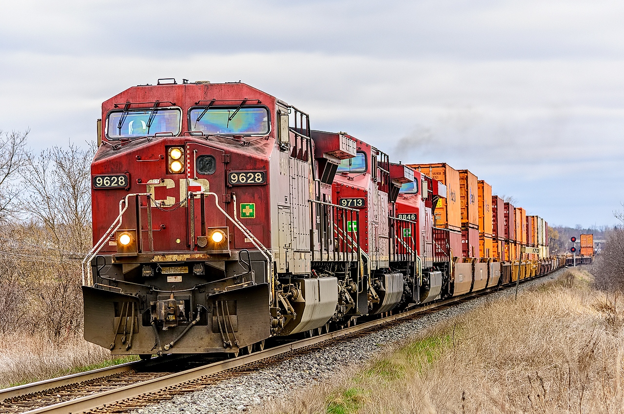 CP 9628 9713 and 8846 coming out of the siding at Darlington having met eastbound ethanol train 608. CP 9713 looks like it might have been on the Holiday Train at some time.