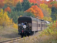 Passengers look back on the line from the rear observation platform of CP's Mount Stephen business car, bringing up the rear of a special Royal Canadian Pacific business train taking a rare-miles trip into Ontario, southbound on the MacTier Sub outside of Tottenham. IIRC, it may have been a Canadian Tire shareholders' special.
<br><br>
For the head end of the train with CP FP9's 4106 and 4107: <a href=http://www.railpictures.ca/?attachment_id=10251><b>http://www.railpictures.ca/?attachment_id=10251</b></a>