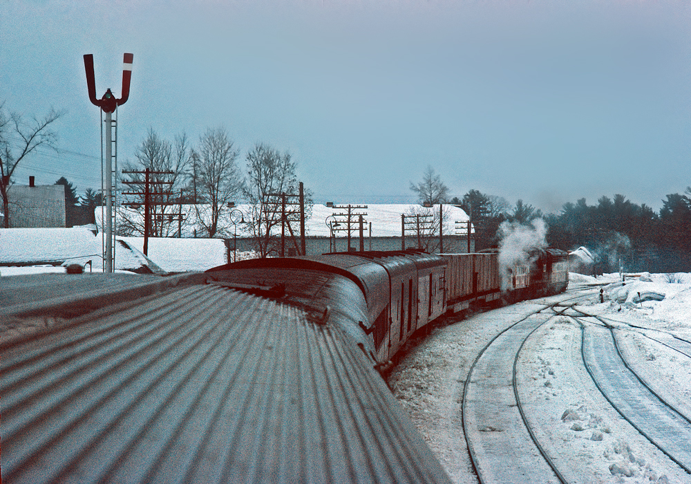 In March 1967 I rode the Atlantic Limited from Montreal to St. John. A skyline car served as diner lounge. The consist was a mix of stainless steel and heavyweight cars. I remember a really good dinner in the skyline the night before. The next morning, most likely after a good breakfast, I wandered into the dome and snapped this picture at (I believe) Fredericton Jct.