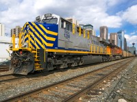 A loaded PRB coal train sits at the "Depot" in downtown Calgary with CERX 1026 and BNSF 7585 on the point. When a new crew takes over, it will back through the west end of Alyth yard, then head north on the Red Deer subdivision. Then, it will be handed off to CN in Edmonton for forwarding to Prince Rupert.