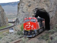 CN 2836 & BCOL 4614 emerge from the tunnel @Kissick and are heading westward in charge of a mixed freight on the Ashcroft sub.