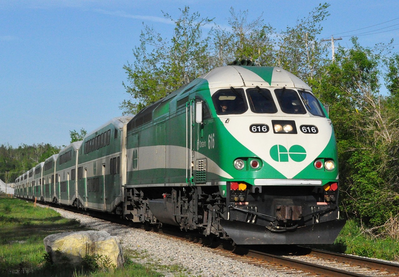 The last morning train on the Kitchener Line rounds the curve at Acton Quarry heading for its next stop at Georgetown.