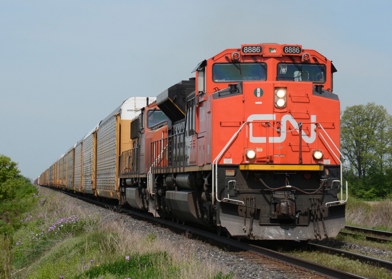 CN8886 with CN5748 head east at Waterworks Road.