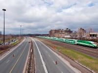 With the Gardner Expressway shut down every year for spring maintenance, Toronto becomes a traffic headache with drivers trying to make there way around the chaos. GO 646 shoves a westbound past a rather empty expressway on this cold spring afternoon.