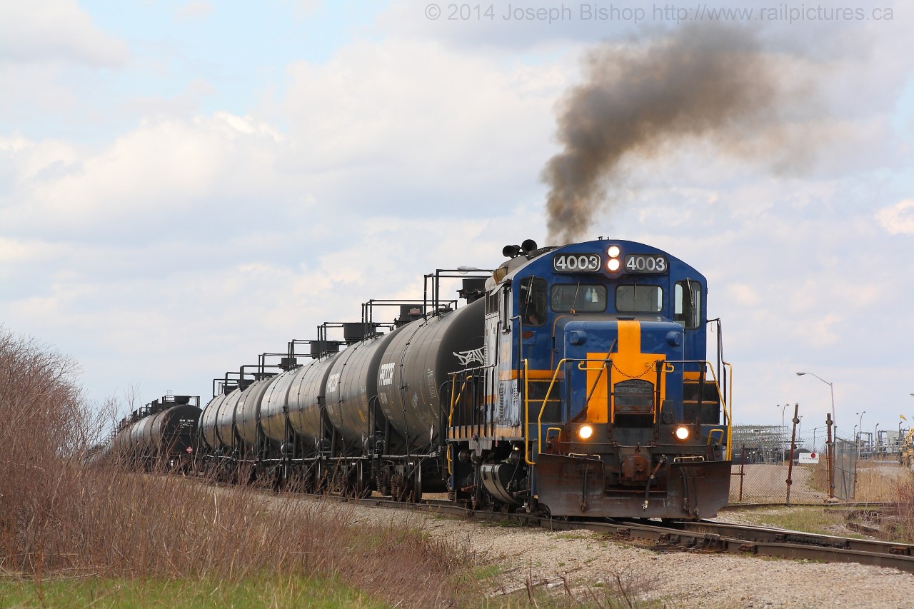 RLK 4003 notches up as they begin to shove a cut of cars back into the Imperial Oil plant in Nanticoke.  It is hard to come by anything but a GP20D on the Hagersville Subdivision so getting to see this classic GP9 was a nice treat.