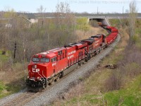 CP 246 glides through a curve on their way to Aberdeen yard in Hamilton with CP 8919 on the point of a very long and heavy train.