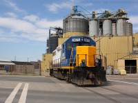 SOR 494 slowly backs across Burlington Street in Hamilton as they enter into the Bunge plant on the Hamilton Waterfront.  RLK 3873 will couple up to some cars on the pier and complete some switching around the plant before returning back to Stuart Street Yard.