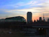 The last GO train run of the evening to Richmond Hill grinds around "what could be" the sharpest mainline curve in the GTA. Well displayed in the background is Toronto's skyline.