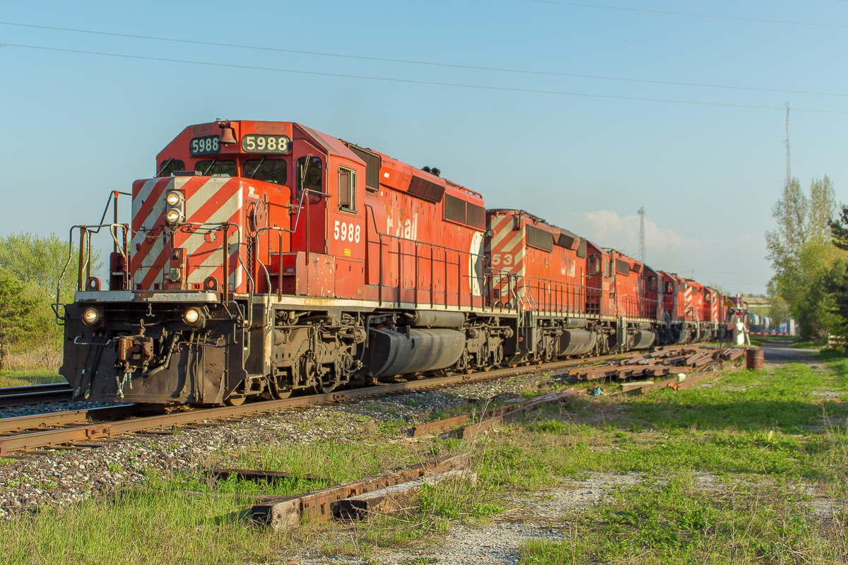 Not your typical sight nowadays. However, CP 421 has proven a few times this sight still is possible. Six variants of SD40-2's (5988, 5953, 5959, 6072, 6040, 9006) are for power of this northbound today. After doing work at Utopia, it pulled into the siding at Essa to wait for its counterpart, 420. The rails would get a work out this evening, as 420 would meet 247 at Baxter, meaning this section of the Mactier would see 3 trains in just 40 minutes. Thanks to those who gave the heads up for this stellar lashup on CP 421.