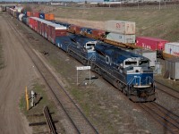 Thanks to a timely heads up I was able to snag M302 with elephant style CN8101 and 8102 rolling into Bissell for a set off before yarding at Walker Yard in Edmonton