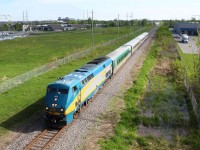 VIA 909 is in charge of a south-west train to Toronto from Ottawa, seen here passing by W Hunt Club Rd in Nepean, ON!