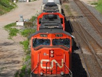 CN 435 slowly approaches CN Snake where its conductor hops on board from Aldershot yard (distance). This train then quickly gets rolling and diverges onto the Dundas subdivision at Bayview junction and continues its journey.