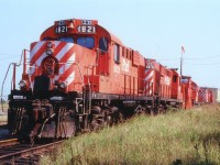 Lineup of interesting power at the old NBEC facility in Campbellton sees four former CP RS-18u locos with a plow  between. The units retained their former CP numbers but the "CP" on the flanks was painted out and replaced with a cruddy "NBEC". One would suppose with 25 of these engines on the roster, painting was out of the question. As it turned out, the NBEC, beginning life as a subsidiary of Quebec Railway Corporation on Jan. 28, 1998, with their mainline the former CN secondary main thru the province,  stumbled along until being bought back by CN in 2008. Another fallen flag. The locos pictured from front to back are x-CP 1821, 1819, plow 55419,  1866 and 1835. To the extreme left by the 1821 one can just make out the bridge over the Restigouche River to Quebec.