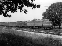 Penn Central was a little over 2 years old now, and here we find New York Central E8 4066 still in its previous owner's colours, with PC E8 4084 trailing, on a passenger train stopped at the station in Fort Erie ON before crossing the International Bridge into Buffalo NY.