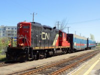 CN-7083 a GS-418d pulling 2 CN car one CN engineering car and a car CN Track evaluation system