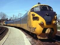 Ontario Northland's Northlander makes its station stop at Washago ON. Still using the TEE trainsets (built in 1957 by the Swiss Industrial Company and acquired in the mid-70's - this one is number 1987), modified FP7's had been mated to them due to the unreliability of the original TEE power cars/locomotives. The trailing cab car was left intact, but never operated from. <br><br> An image of a set on delivery with original power car can be seen here (taken by Arnold Mooney): <b><a href=http://www.railpictures.ca/?attachment_id=12462>http://www.railpictures.ca/?attachment_id=12462</a></b>