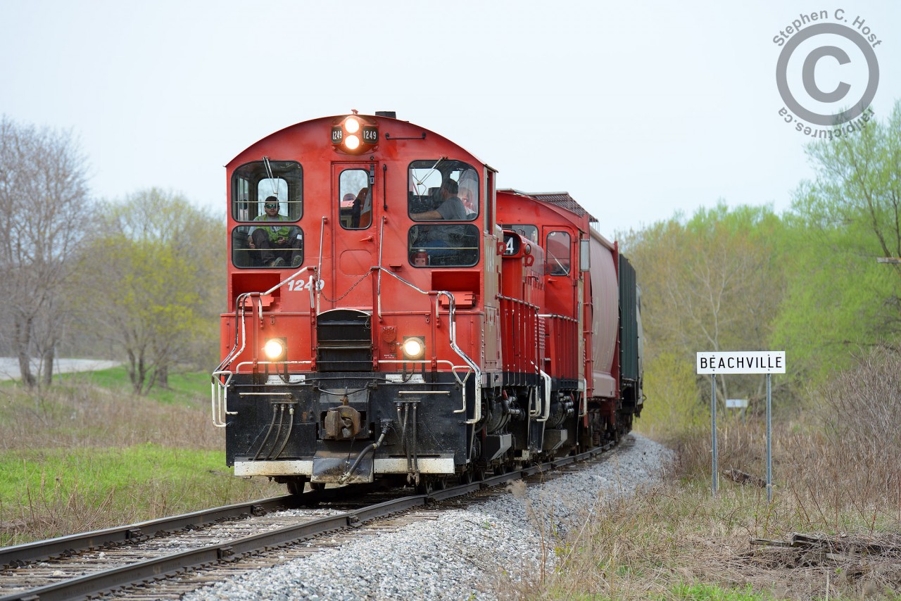 A pair of pups round the curve 1 mile from Beachville, Ontario headed to Woodstock.
