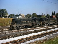A pair of Pennsylvania Railroad Baldwin RS12's, PRR 8108 and 8105, handle a transfer from Buffalo, arriving on the Canadian side of the border in Fort Erie ON. One would be hard-pressed to find Baldwins operating in service today, much less on a Class 1 Railroad. <br><br> <i>Editor's Historical Note: The RS12 (while it sounds like an ALCO designation) was a successor to the DRS4-4-1000 and VO-1000 units produced by Baldwin earlier on, not many of which were produced for Canadian Railways, but occasionally made inroads into Canada via foreign railways.</i>