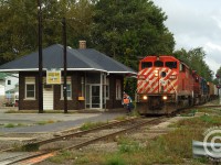 The conductor for Sarnia-Chatham D725 has just detrained off SD40-2F 9019 to grab paperwork inside the Chatham Station. Trailing engines are CP 6059 with CSXT 2561 and CSX 2570 and the train had about 40 cars. Two CSX engines were brought down from Sarnia, set-off in the Chatham Yard to be used on a D724 from Chatham to Blenheim, returning to Sarnia later that day. <br><br>For anyone who is interested in CSX Ontario's modern day operations, check out the May 2014 edition of <b>Railroads Illustrated</b> where I have had an article published about the CSX. While it doesn't compare to the stuff those senior to me have photographed and posted here lately, the article is a snapshot in time of the operations of the fascinating former C&O Canadian Division focusing on the present day. The article also includes some photos never before published. Check out your local hobby shop for a copy or you can order from their website <a href=https://www.whiteriverproductions.com/shopexd.asp?id=242>here</a>. Thank you.