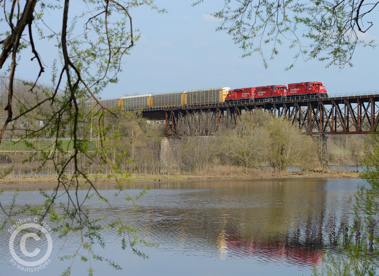 T72 has arrived at Galt, Ontario - and so has spring. In a few days the trees seen here will be lush with foliage. One year ago this shot was with three freshly overhauled GP38-2's - how times have changed.