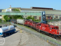 TH11 is nearly across the diamond (automatic interlocking) with the N&NW spur and is about to enter the Wilcox Yard lead for Railcare. 