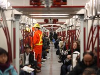 <i><b>Vanishing Point</b></i>
<br><br>
Looking down the full six-car length interior of a brand new Toronto Rocket subway train, loaded and ready to depart Toronto Union Station up the Yonge line.