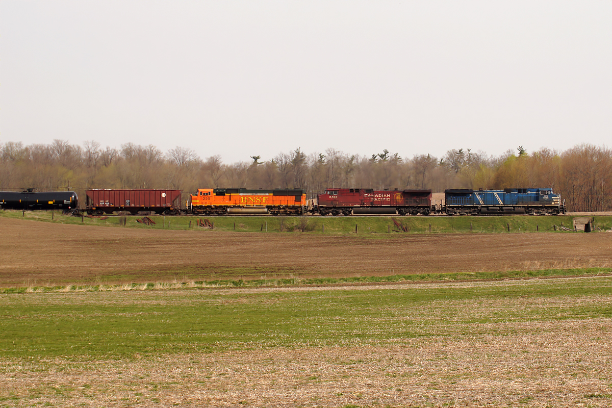 With CP 9709 and BNSF SD70MAC 255 leading oil east. Nice spring colours.