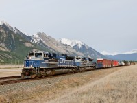 Former EMDX SD70ACe-P6's 1208 and 1209 now wearing different numbers for CN bring Vancouver, BC - Winnipeg, MB train M302 to a stop at Henry House for a meet with two westbounds.