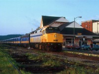 It's a fine June morning in 1987 at Sherbrooke, Quebec. VIA's "Atlantic" westbound has just arrived, on time, at 5:59AM.
