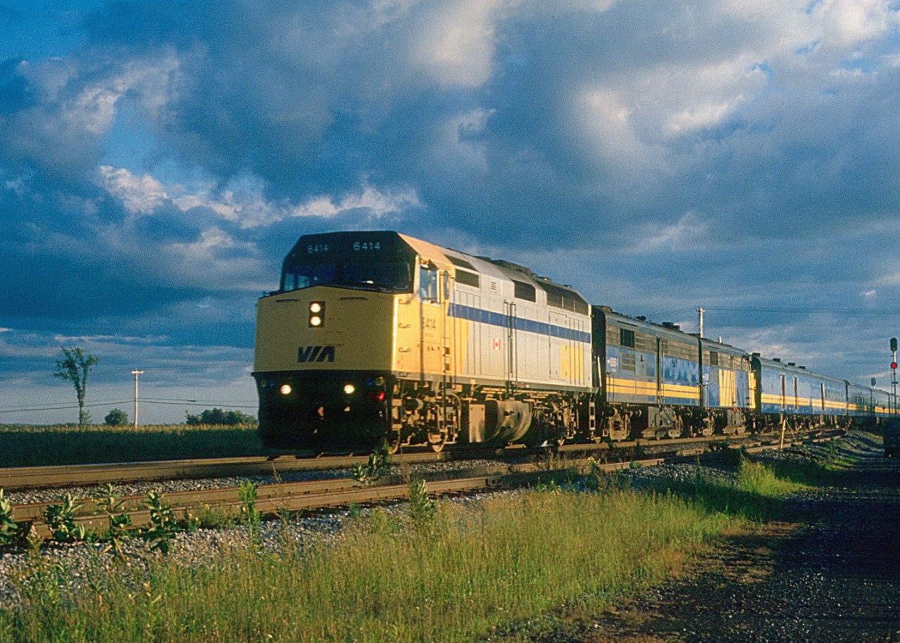 Two months later after I shot this locomotive at Sherbrooke on VIA's Atlantic, we find it eastbound at Saint Germain-de-Gratham, Quebec, just west of Drummondville, with "The Ocean" and running at track speed in August of 1987.