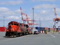 CN 7083 lifts a cut of containers from the South End Container Terminal in Halifax.