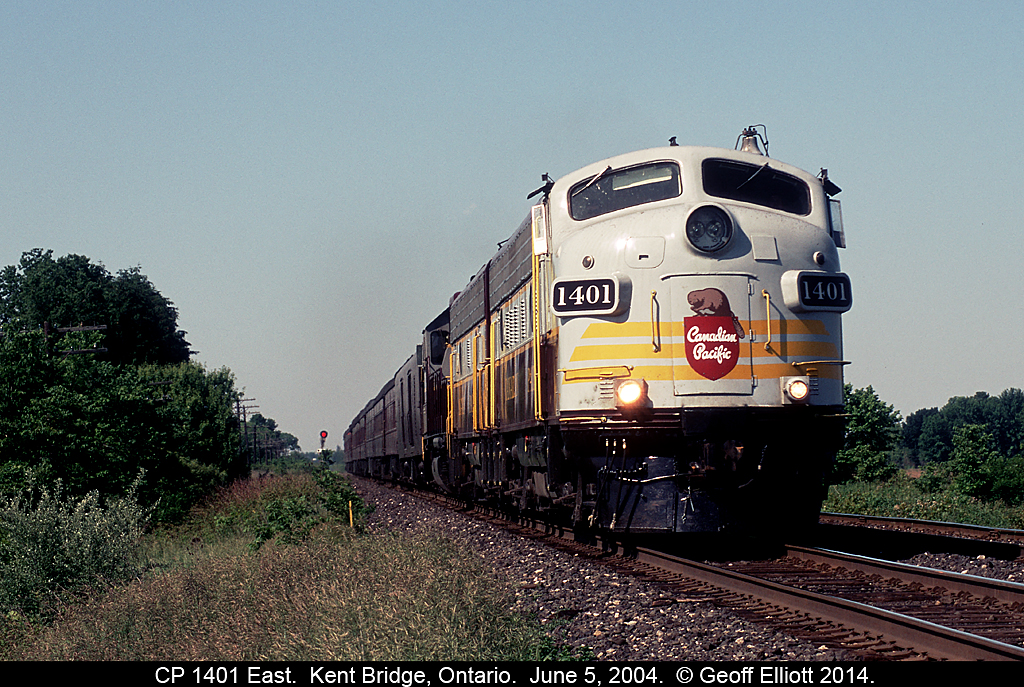 CP 1401 slows as it approaches Kent Bridge to allow a westbound freight to take the siding.  Good thing too since 1401 was allowed to run passenger speed on the Windsor/Galt subs.  With him having to wait on the westbound it was just the advantage we needed to get ahead of him and shoot him again at Lobo!!