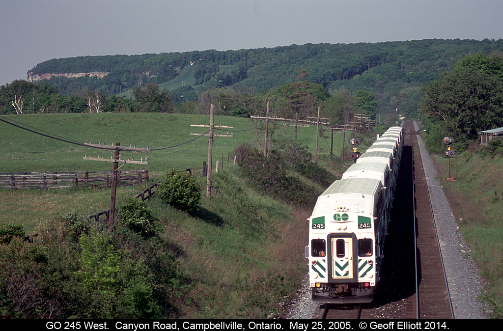 The Engineer in GO Cab Control Car #245 has his train well under control as they climb westbound from Milton to Campbellville, Ontario on CP's Galt Subdivision.