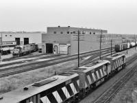 Thirty years ago CP Rail tested BBD's new offerings …. and those BBD Demonstrators were.....Everywhere !
<br>
<br>
...but it was not to be...the only BBD sales (that I know of) were to CN: the HR616 model for twenty units (2100 to 2119) and ten HR412W (2580 to 2589). 
<br>
<br>
James Adeney summed up the situation succinctly: “In 1983, MLW (by then Bombardier) made one last all-out effort to return CP to the fold and demonstrated their latest six-axle offering, the HR616. Borrowing four that had already been delivered to CN, they applied Bombardier logos to the sides of the nose, and removed the CN logo. Other than that, they were pure CN. It was all for naught, as CP still had a bad taste in its mouth and was in the middle of a love affair with the SD40-2. “ 
<br>
<br>
A. W. Mooney provides additional quality comment: (the units were) “reacquired by Bombardier along with (2100) 2101-2103 to operate as demonstrators 7001-7004 on CP between Feb 1983 and May 1984. The BBD HR616 3000 HP units were rated 3200 HP while on CP. After the trial, the units reverted to their old slotting on the CN roster. CP did not take an interest, and just as well, this model was associated with aggravations and the CN fleet was off roster by 1998.” 
<br>
<br>
Indeed, as the HR was supposed to represent 'High Reliability' ….
<br>
<br>
...so what could have been never was....nevertheless...those BBD Demonstrators on CP Rail passing the ONR North Bay Shops: note the nearly new ONR GP38-2 ( 18xx ) coupled to a ONR SD40 ( 17xx ) and in the background is the spare ONR Northlander trainset. 
<br>
<br>
So, here is CP Rail #482,  powered by BBD HR616 Demonstrators #7004 – 7002 – 7001 – 7003, rolling past the ONR North Bay Shops, May 22, 1983 Kodak Plus X negative by S. Danko
<br>
<br>
What's interesting: In the film photography era, Kodachrome was slow ( ASA (ISO) 64 ) and relatively expensive, so when the weather got gray and contrast poor it was common to switch to Kodak Plus X ( ASA 125) or Tri X (ASA 400 ) or even the new Ilford films ( ASA400) – and even today the reliable Nikon film bodies perform flawlessly, no batteries required !
<br>
<br>
More BBD
<br>
<br>
<a href="http://www.railpictures.ca/?attachment_id=15019">  BBD at Agincourt </a> 
<br>
<br>
<a href="http://www.railpictures.ca/?attachment_id=2007">  HR616 on CN  </a> 
<br>
<br>
More North Bay
<br>
<br>
<a href="http://www.railpictures.ca/?attachment_id=8056"> CP ONR  VIA all in one </a> 
<br>
<br>
<a href="http://www.railpictures.ca/?attachment_id=8614">  nearly new GP 38-2 </a> 
<br>
<br>
sdfourty
