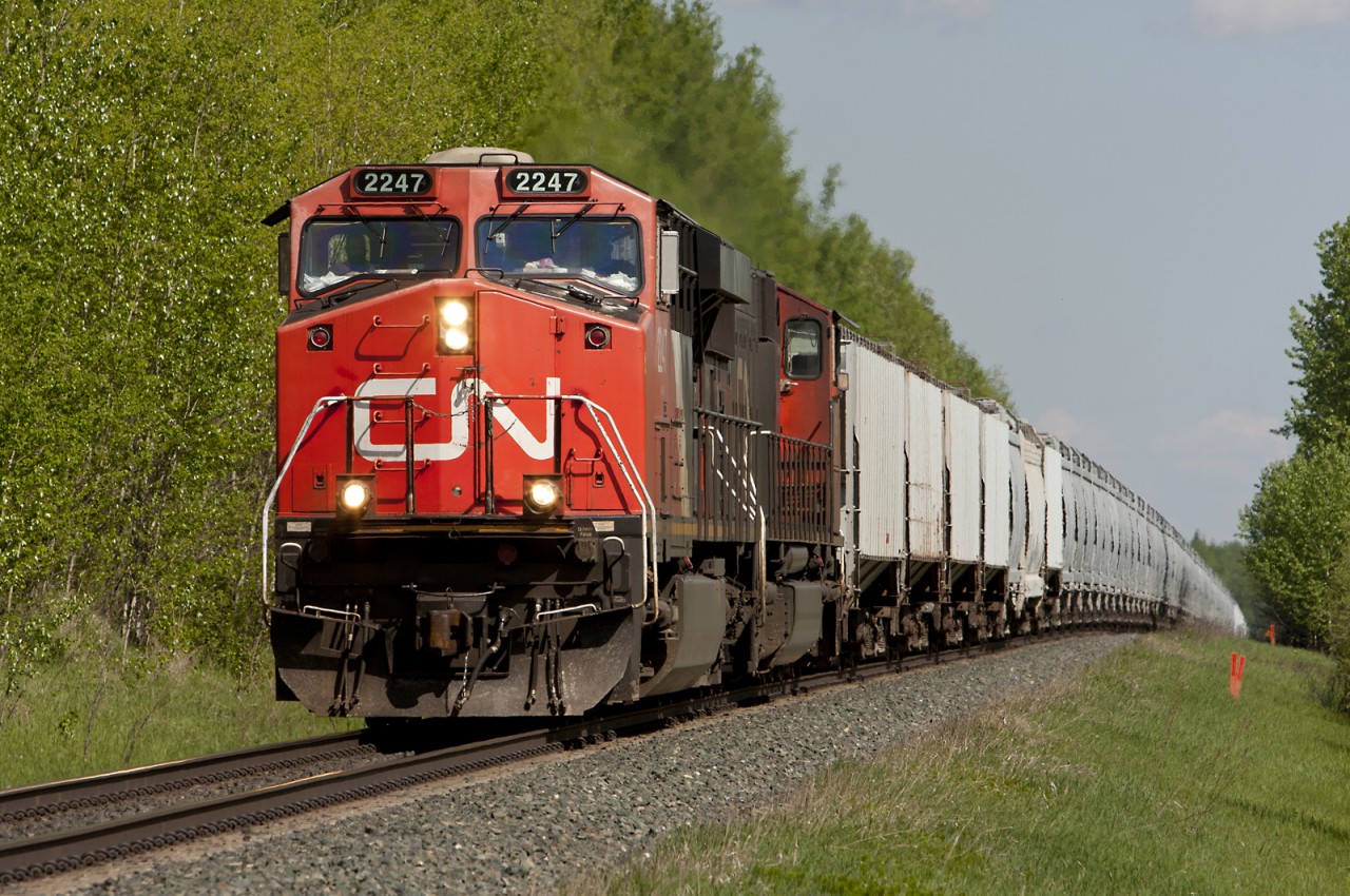 CN train U773, unit frac sand to Grande Prairie, pulls up the short hill west of Wildwood Alberta
