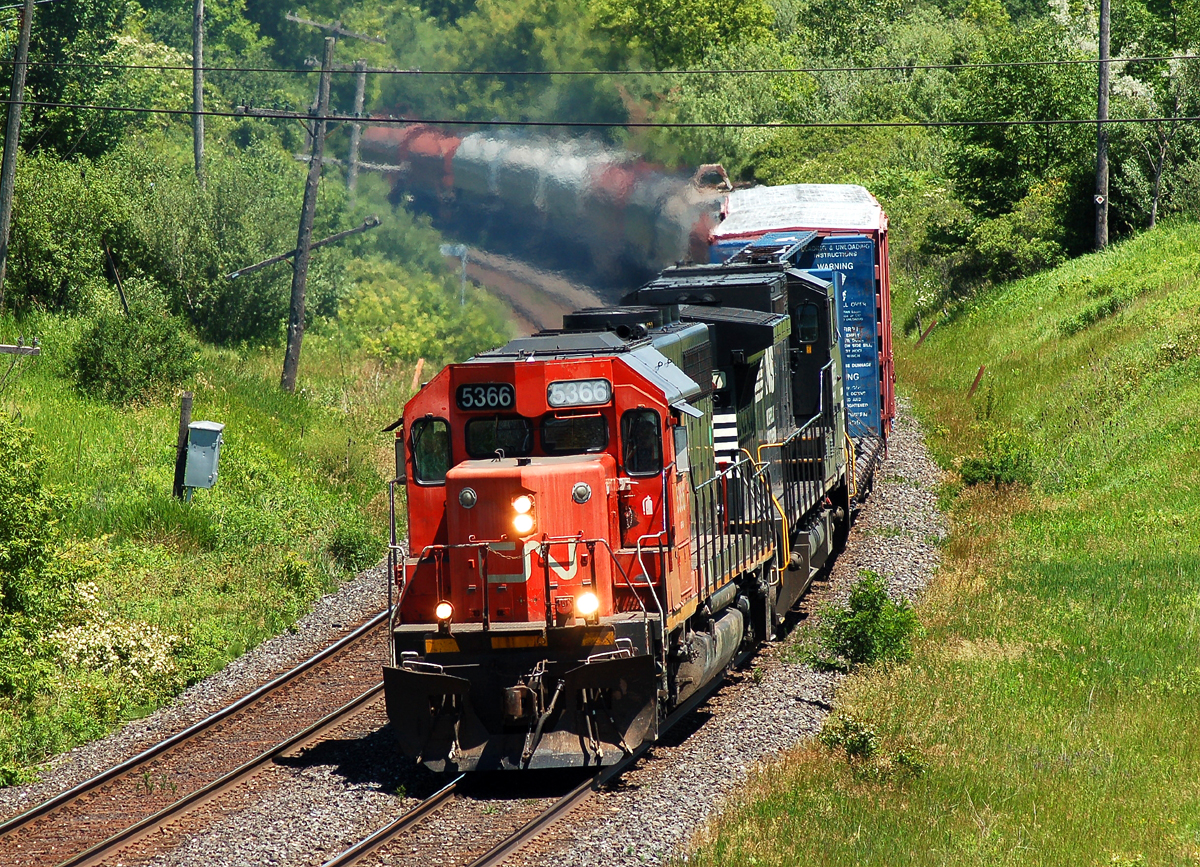 CN 5366 and NS 8327 leading 331 past Garden Ave