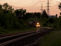 The daily Expressway train breaks the silence at sunset with a pair of SD40-2's.