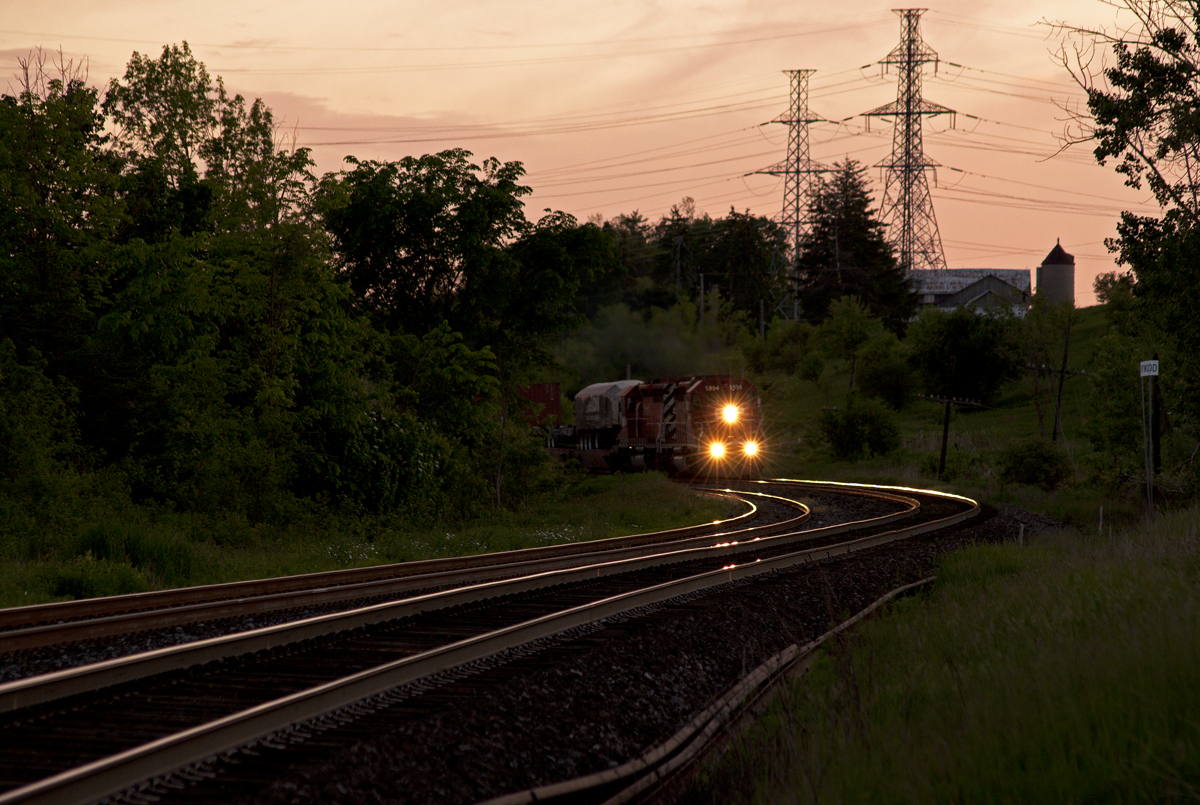 The daily Expressway train breaks the silence at sunset with a pair of SD40-2's.