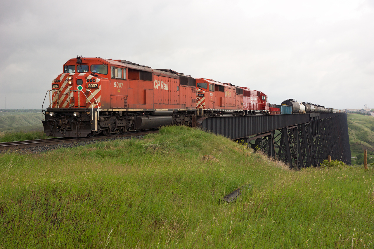 CP 463, the daily Moose Jaw-Eastport manifest, rumbles across the High Level Bridge in Lethbridge with a little under 100 cars in tow.