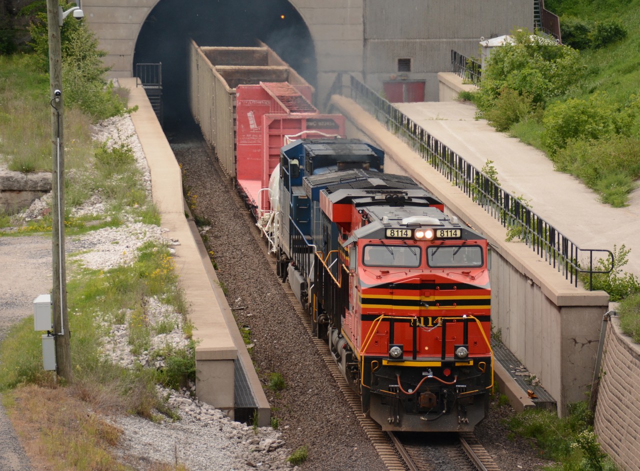CN train 148 exits the St. Clair River tunnel with Norfolk Southern heritage unit NS8114 leading CEFX1036 into Sarnia. They will return to Port Huron later as train 501. Thanks for the heads up Chris G.