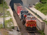CN train 148 exits the St. Clair River tunnel with Norfolk Southern heritage unit NS8114 leading CEFX1036 into Sarnia. They will return to Port Huron later as train 501. Thanks for the heads up Chris G.