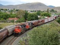 CN nos.8891 & 2189 are awaiting a couple of pass-bys before they can continue westwards with this mixed freight.